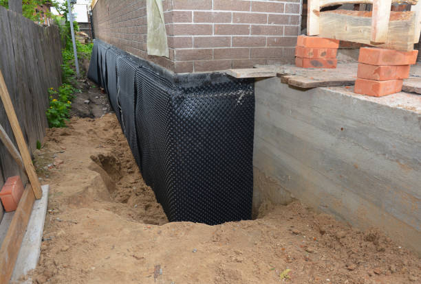SJ Waterproofing Pros technician performing targeted Waterproofing assessment in Markle, IN